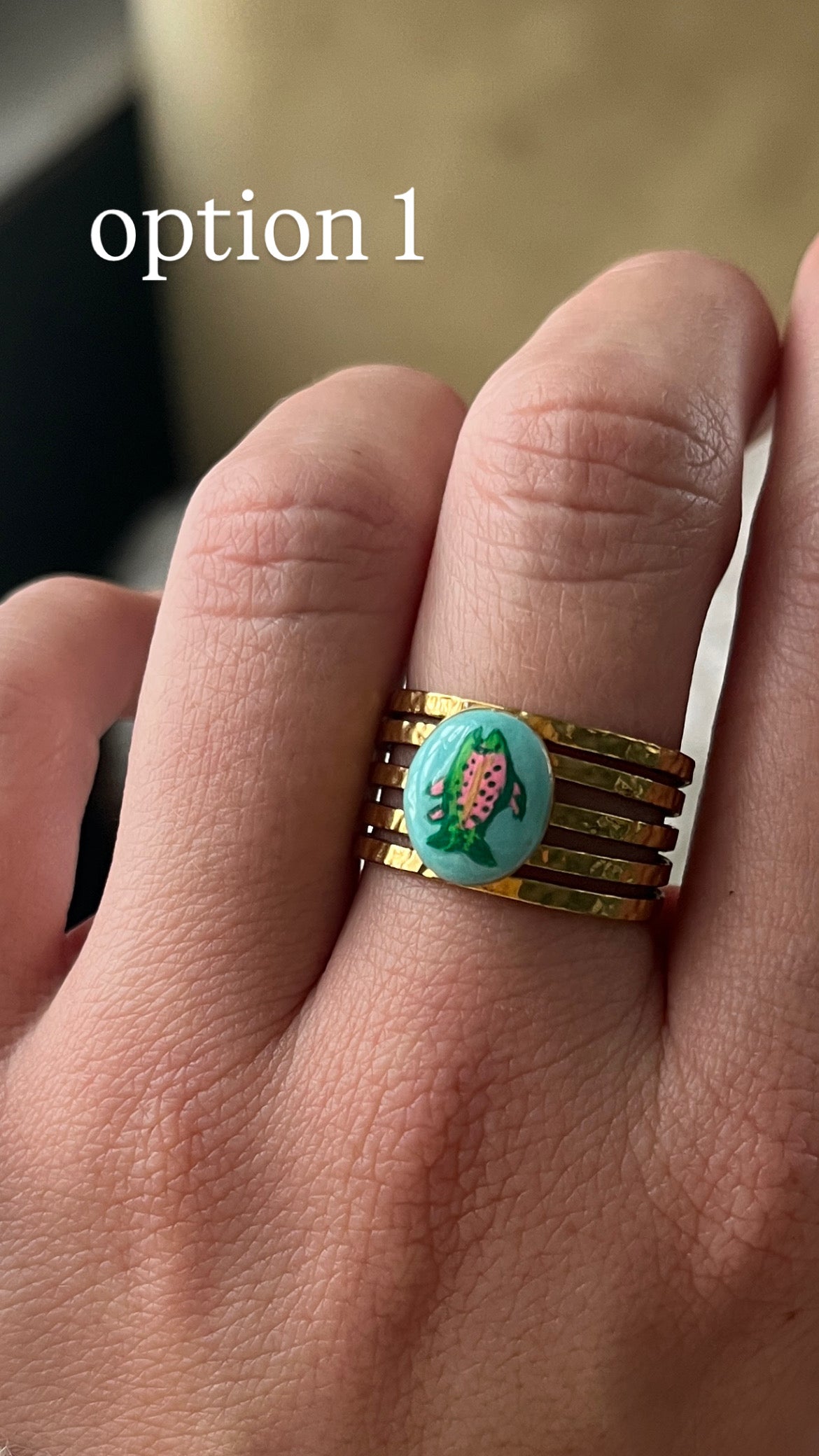 Trout Ring with turquoise background