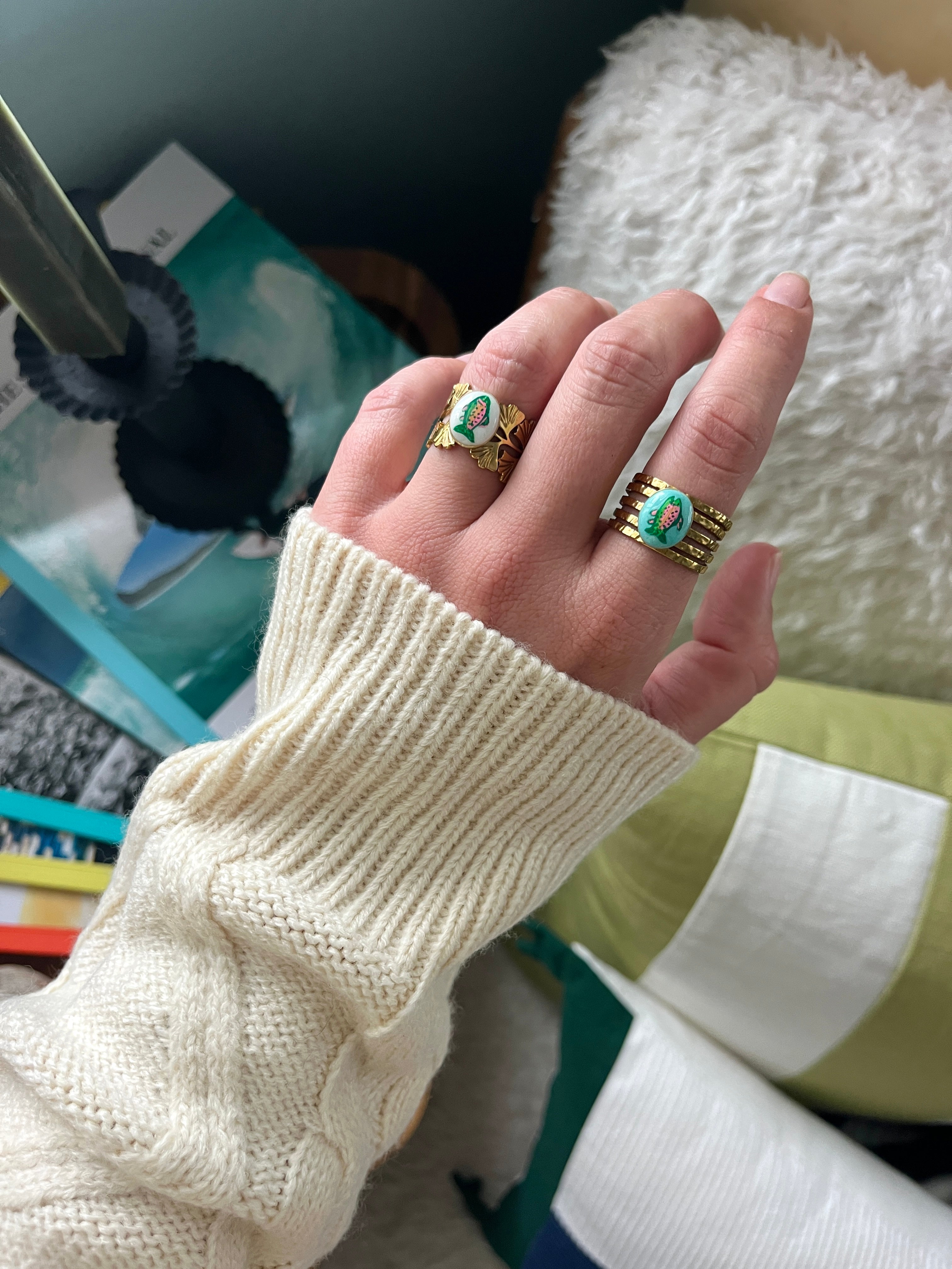 Trout Ring with turquoise background